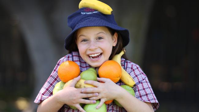 Health bodies are calling for a ban on junk food advertising on public transport so students like South Yarra Primary’s Maya can enjoy a healthy diet. Picture: David Caird