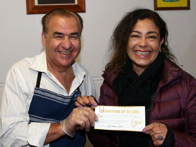 Rocky Massaria hands over a cheque to Station Drop In Centre team leader Graciela Luna. Picture: Craig Wilson