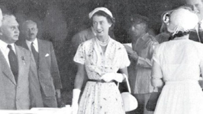 Queen Elizabeth II and Prince Philip are welcomed to Mackay by city officials at the harbour on March 15, 1954. Photo: Daily Mercury Archives