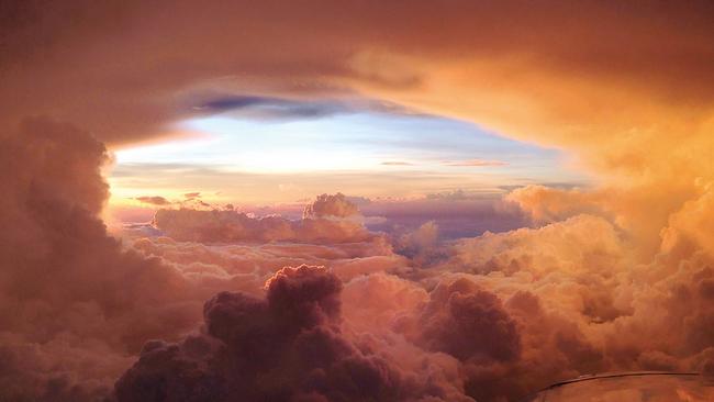 A path through the clouds between Townsville and Richmond, Queensland. Picture: Captain Victoria (Vicki) Harrison.