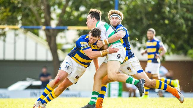 Lloyd Gorman tackled by Landon Hayes and Matt Smit.Picture: Richard Walker