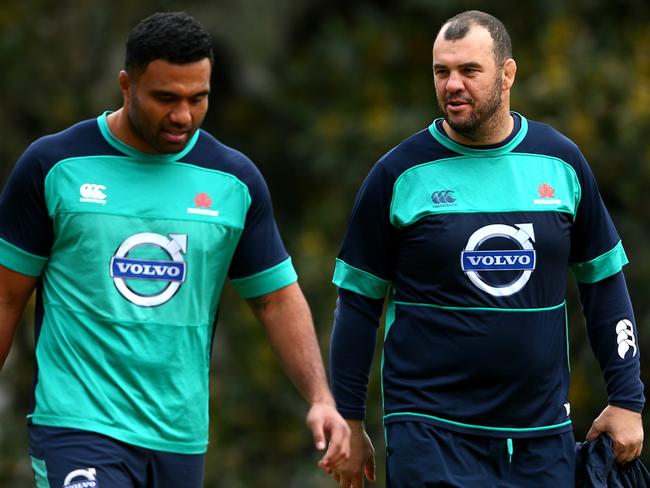 Michael Cheika (R) talks to Wycliff Palu at Waratahs training earlier this year.