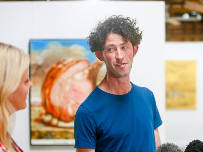 Hobart artist Robert O'Connor won the Glover Prize with his painting of a lamb dinner in a southern Tasmanian agricultural landscape. Picture: PATRICK GEE