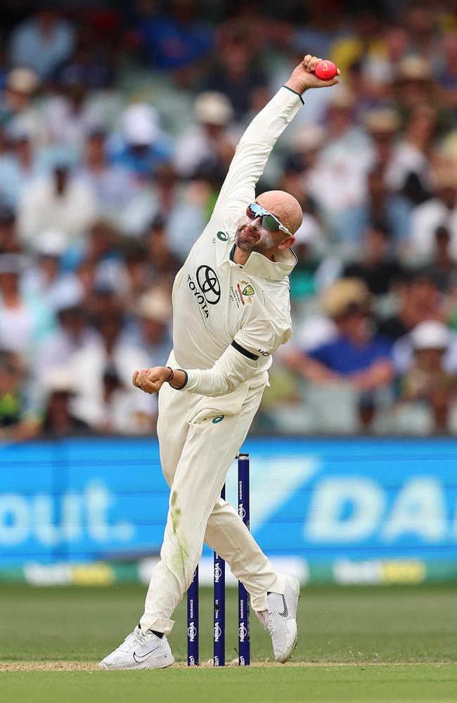 Nathan Lyon rolling the arm over for one of his six deliveries in Adelaide. Picture: Paul Kane/Getty Images.