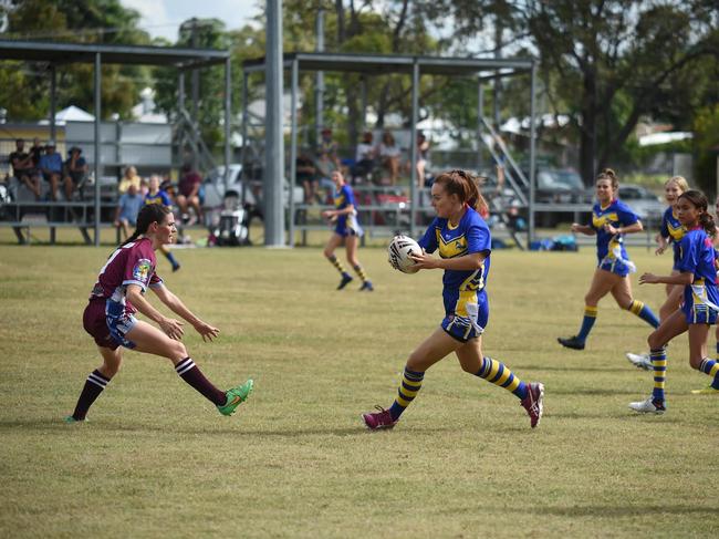 Marlins player/coach Kym McIntosh in action against the Isis Devils in the NDRL Women's Touch League.