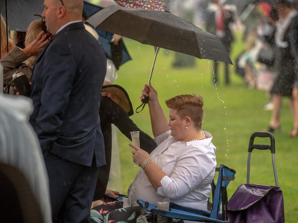 Heavy rain hits Flemington. Picture: Jason Edwards