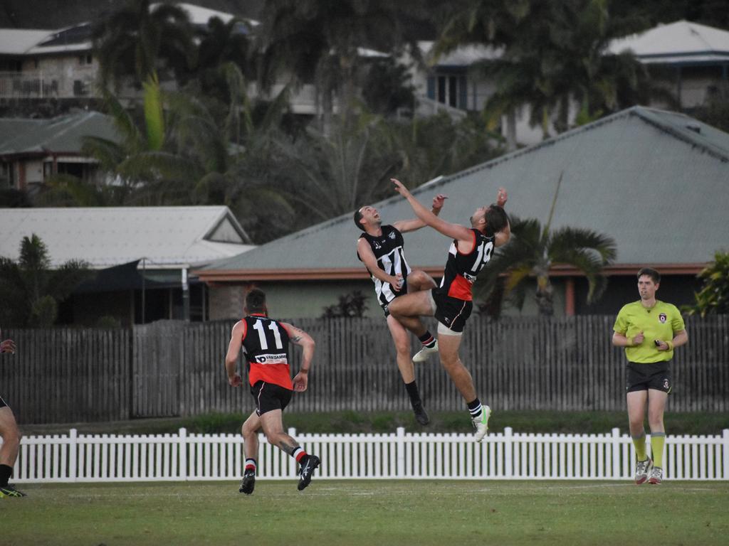 Nick Thiele and Liam Byrne in the North Mackay Saints v Mackay Magpies AFL premier grand final, September 11, 2021. Picture: Matthew Forrest