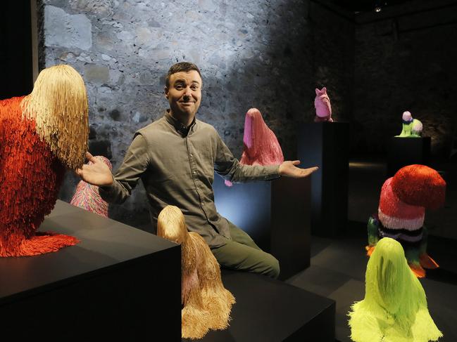 Artist Troy Emery with some of the pieces from his Wildlife exhibition at Rosy Barn, for the Clarence City Council and Dark Mofo. Picture: MATHEW FARRELL