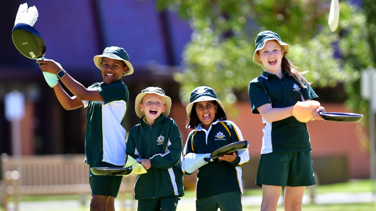 Gjsovaun, Zachary, Rhea and Emilia practised for the 50m pancake-tossing relay race at Westminster Prep School in South Australia in 2017. Picture: Mark Brake