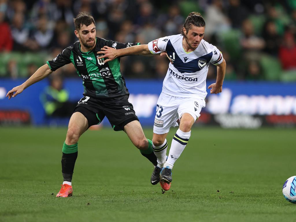 Western United’s Ben Garuccio (left) battles Melbourne Victory’s Marco Rojas during the Victory’s 1-0 semi-final first-leg win. Picture: Robert Cianflone/Getty Images