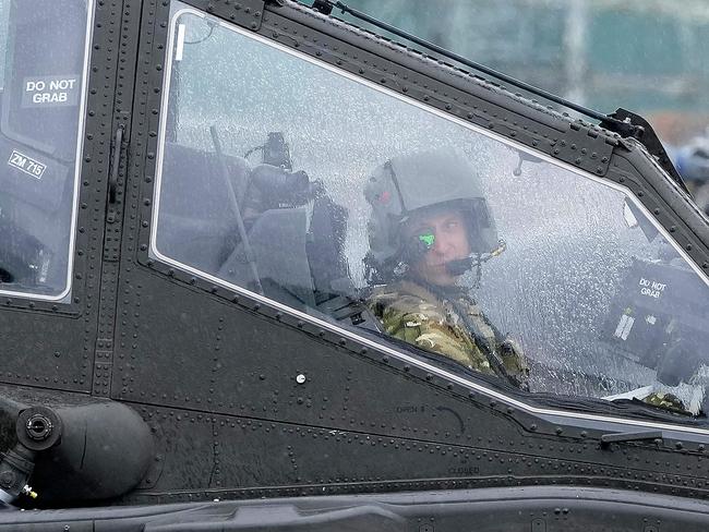 Prince William sits in the cockpit of an Apache helicopter. Picture: AFP