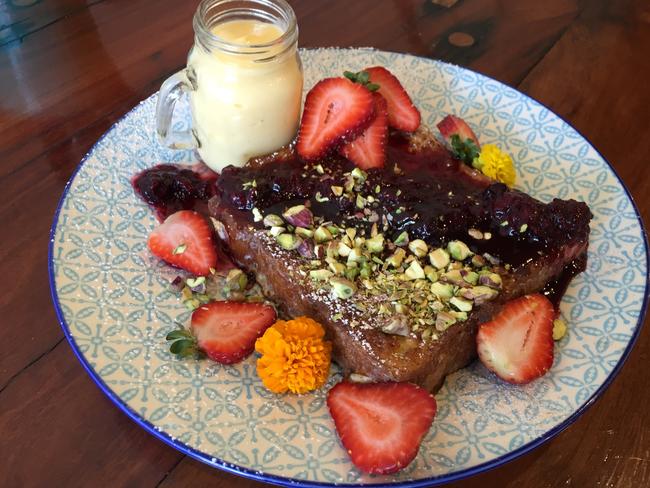 Seta's Cafe’s Cinnamon French toast made with brioche, vanilla custard, crushed pistachios, and mixed berry compote. Picture: Jenifer Jagielski