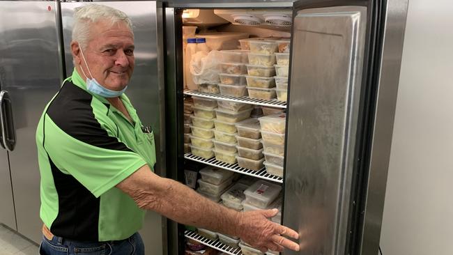 Ballina Hot Meal Centre chairperson and president of the Rotary Ballina-on-Richmond Club, Cole Lee, with some of the frozen meals prepared for those in need during the lockdown.