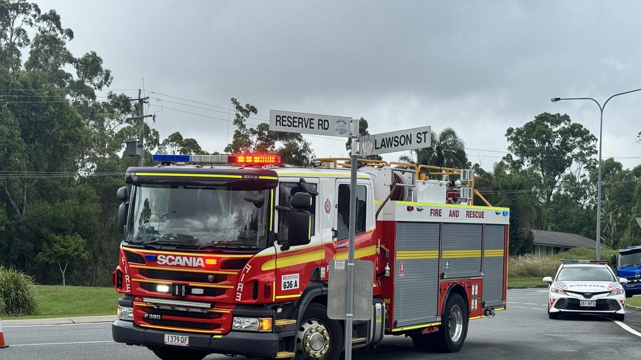 Emergency service on scene after a car was pushed into a house on Lawson St, Upper Coomera. Photo: supplied.