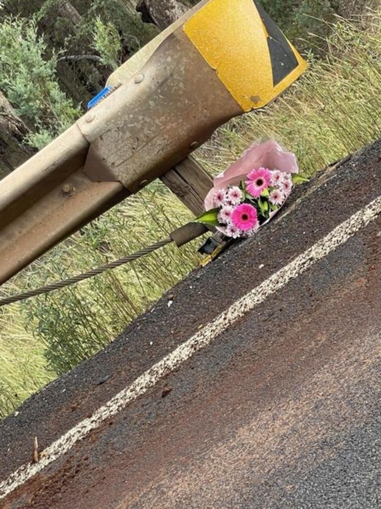 Dubbo highway patrol officers who attended the crash at Ballimore returned to the scene the following morning to lay flowers in memory of 16-year-old Meika Pokarier. Picture: NSW police