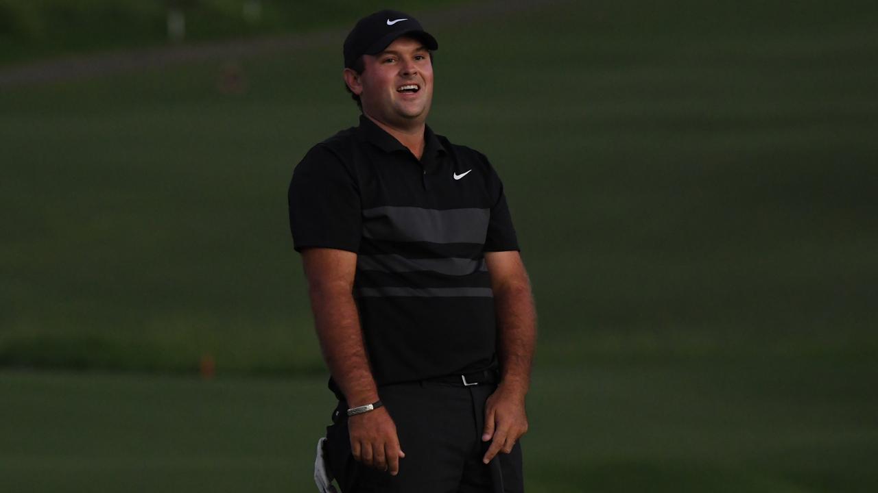 Patrick Reed of the United States reacts to a missed putt during the third playoff hole on the 18th green.