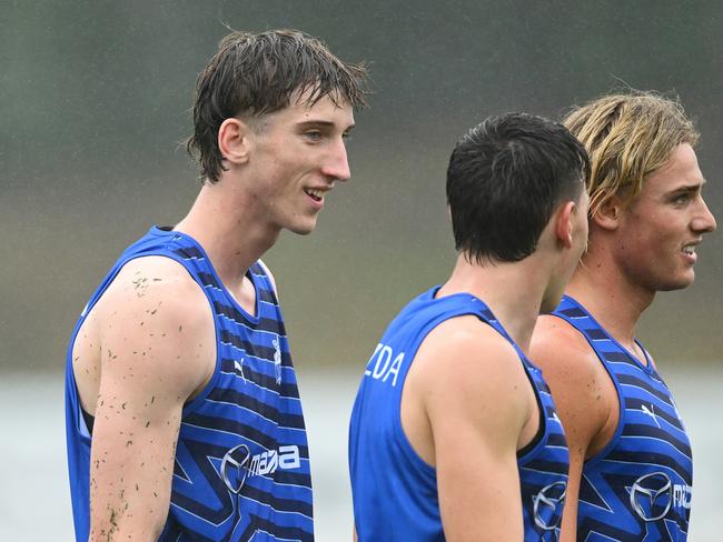 Matt Whitlock, Finn O'Sullivan and Luke Urquhart are all fighting for a debut at North Melbourne in 2025, with Urquhart impressing at training so far. Picture: Quinn Rooney