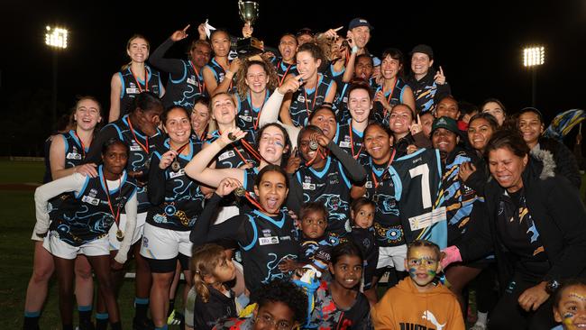 Alkamilya celebrate after winning the 2023 CAFL senior women's grand final. Picture: AFLNT Media