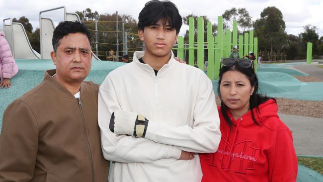 Hundreds of people have gathered at a rally to support Tarneit teenager Rhyan Singh to call for tougher youth crime laws. Father- Rajiv Singh, Rhyan Singh and mother Sushma Manandhar. Picture: David Crosling