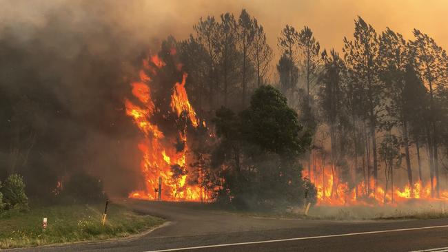 The blaze threatening homes on Thursday.