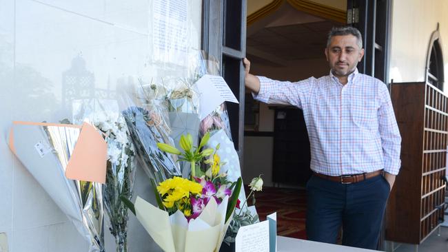 Islamic Society of SA president Ahmed Zreika with flowers left at the Marion Mosque. Picture: Brenton Edwards/AAP