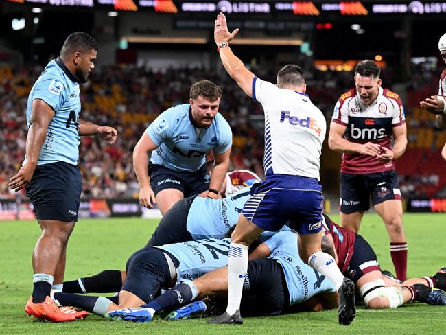 Reds players celebrate after Angus Blyth scores a try. Picture: Getty