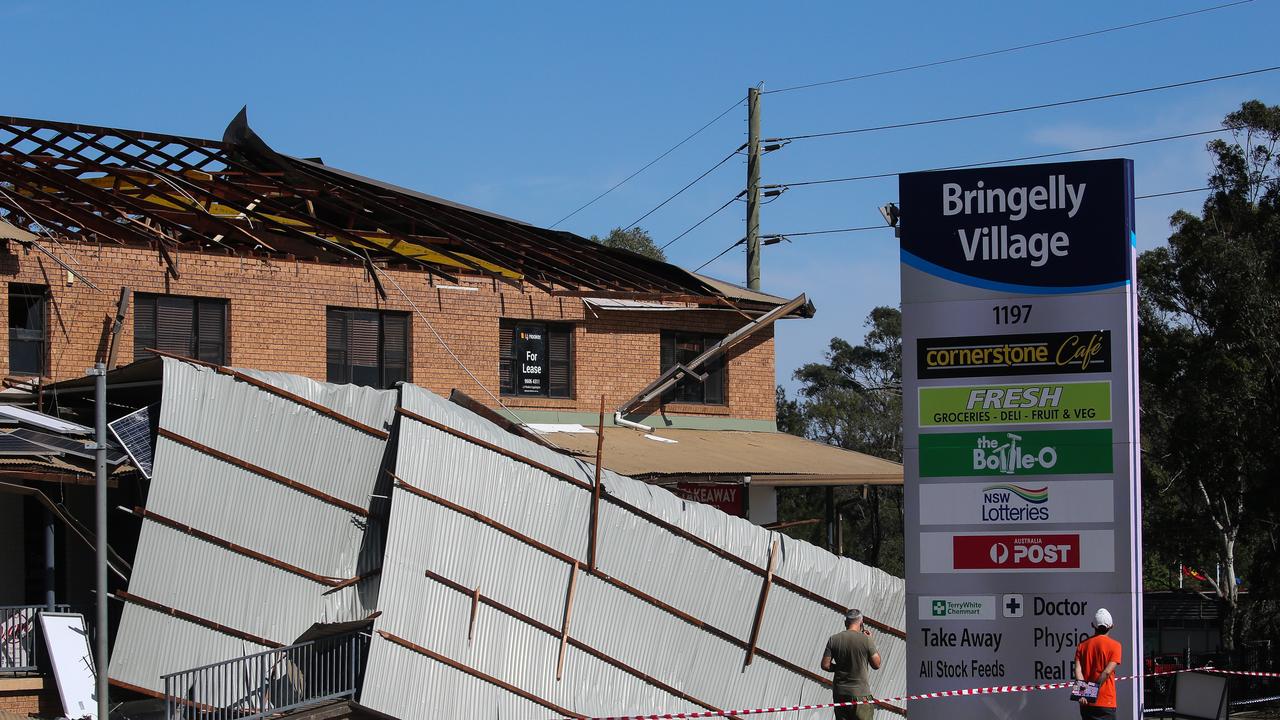 Fresh and Faded Barber Shop Owner Haitham Sudany received a text that the roof of the building had blown off the building during severe winds. Picture: NCA Newswire /Gaye Gerard