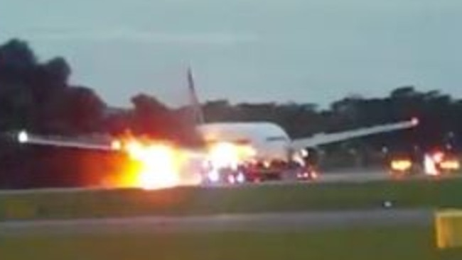 The Singapore Airlines plane was ablaze during the emergemcy landing. Picture: Twitter/aDiLahLovatics