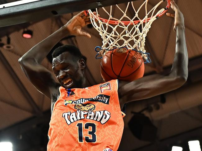 Majok Deng of the Taipans dunks during the round 17 NBL match between Cairns Taipans and Adelaide 36ers at Cairns Convention Centre, on January 30, 2023, in Cairns, Australia. (Photo by Emily Barker/Getty Images)