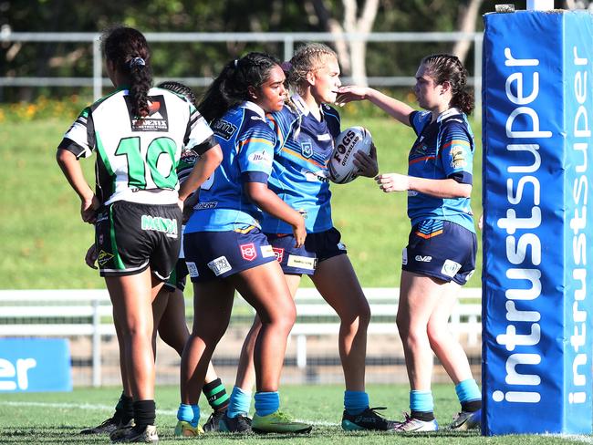 Northern Pride captain Kaiyla Ward (centre) celebrates her matchwinning try against the Townsville Blackhawks at Barlow Park. Picture: Brendan Radke