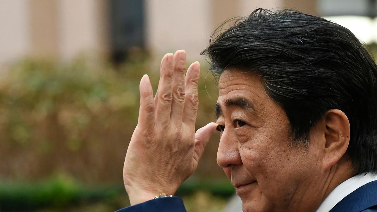 The Sydney Opera House will be draped in red and white on Sunday night, as Australian leaders pay tribute to former Japanese Prime Minster Shinzo Abe.(Photo by JOHN THYS / AFP)