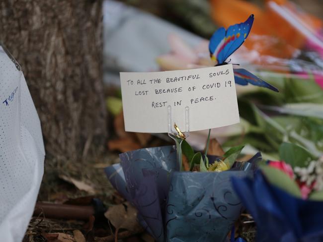 Flowers laid outside Newmarch House. Picture: Christian Gilles