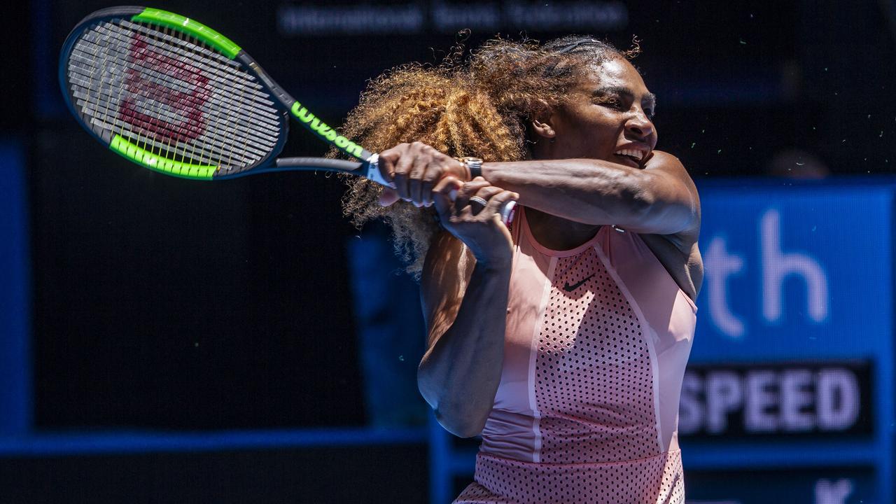 Serena Williams plays a double-handed backhand at the Hopman Cup. 
