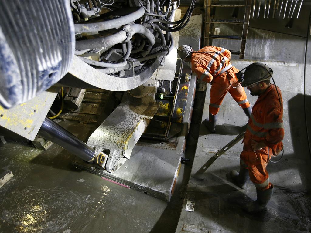 Workmen underground laying Ring 636 in the North West Rail Link tunnel. The North West Rail Link is underway and TBM Elizabeth has cut through 1092metres of earth travelling East from Bella Vista. Picture: Bradley Hunter