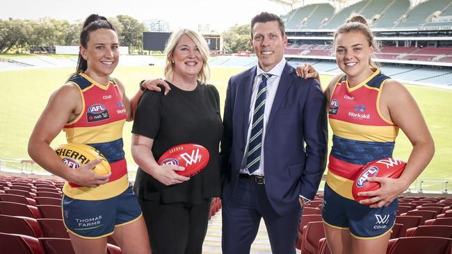 Fagan with Crows Women's AFL players Jessica Sedunary and Ebony Marinoff and Workskil CEO Nicole Dwyer. Picture: AAP