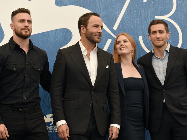 : Actor Aaron Taylor-Johnson, director Tom Ford, actress Amy Adams and actor Jake Gyllenhaal attend the photocall of the movie “Nocturnal Animals” presented in competition at the 73rd Venice Film Festival on September 2, 2016. Picture: AFP