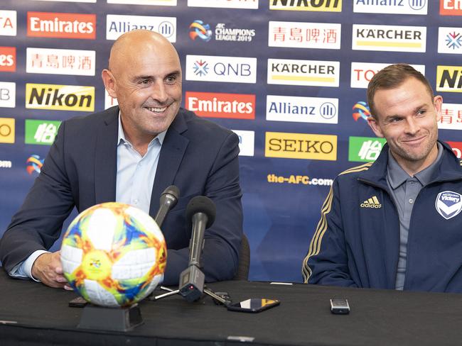 Melbourne Victory coach (L) Kevin Muscat and player Leigh Broxham (R) speak to the media during a press conference ahead of Victory's opening Asian Champions League clash against Daegu FC in Melbourne, Monday, March 4, 2019. (AAP Image/Ellen Smith) NO ARCHIVING