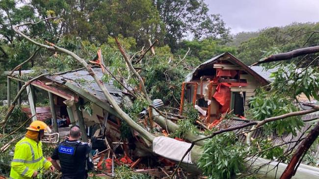 A house has been crushed by a tree at Currumbin Valley. Picture: Qld Ambulance Service, Facebook.