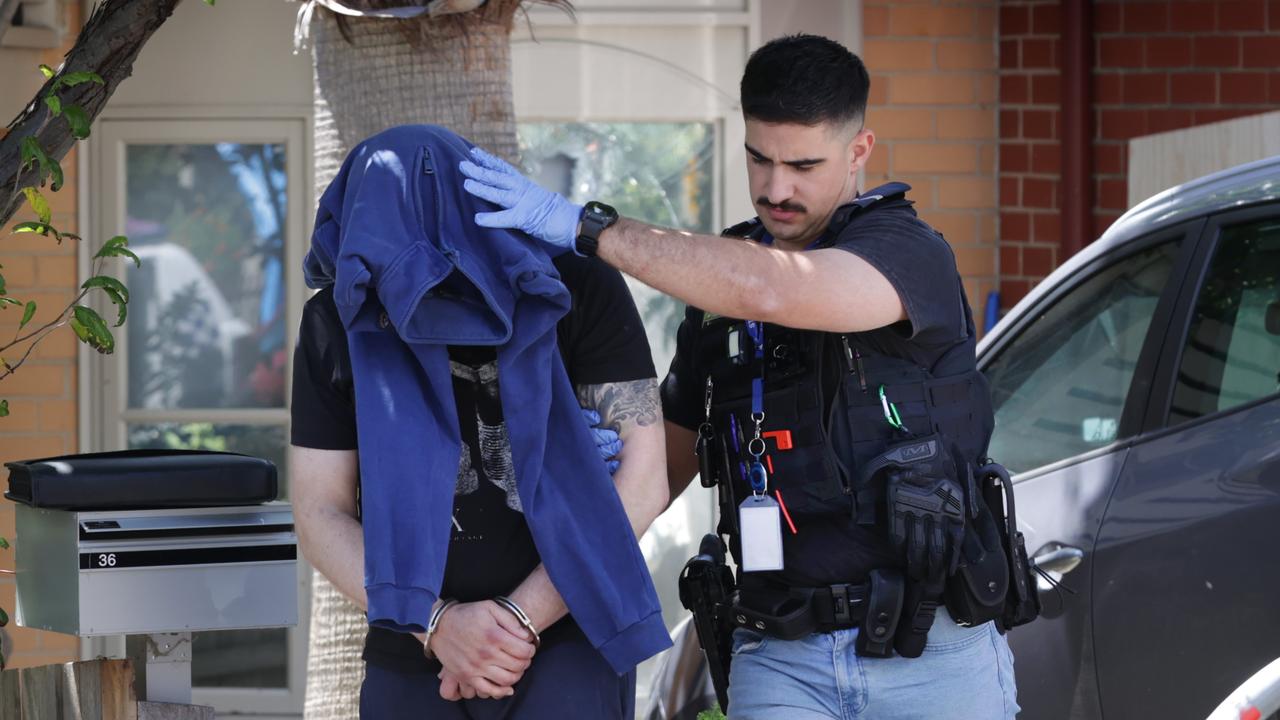 St Kilda crime: Police raid Octavia St complex and arrest three people ...