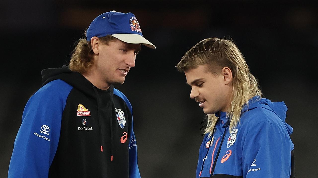 MELBOURNE, AUSTRALIA – JULY 01: Aaron Naughton and Bailey Smith of the Bulldogs are seen prior to the round 16 AFL match between Western Bulldogs and Fremantle Dockers at Marvel Stadium, on July 01, 2023, in Melbourne, Australia. (Photo by Robert Cianflone/Getty Images)