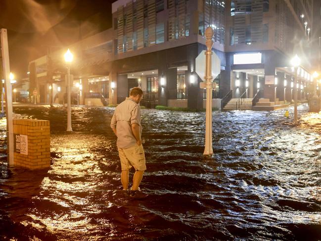 People are waiting to assess the damage after the Cat 3 hurricane came ashore.