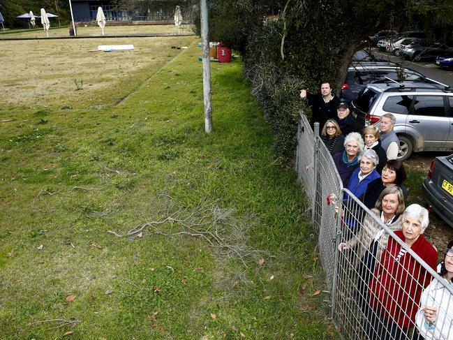 Members of the Friends of Trumper Park looking onto the greens of Paddington Bowling club. The group would like the club land to be rezoned as public recreation so it can once again be part of Trumper Park for the enjoyment of the community. Picture: John Appleyard