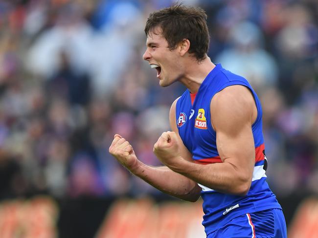 Josh Dunkley of the Bulldogs reacts after kicking a goal during the Round 8 AFL match between the Western Bulldogs and the Brisbane Lions at Mars Stadium in Ballarat, Saturday, May 11, 2019.  (AAP Image/Julian Smith) NO ARCHIVING, EDITORIAL USE ONLY