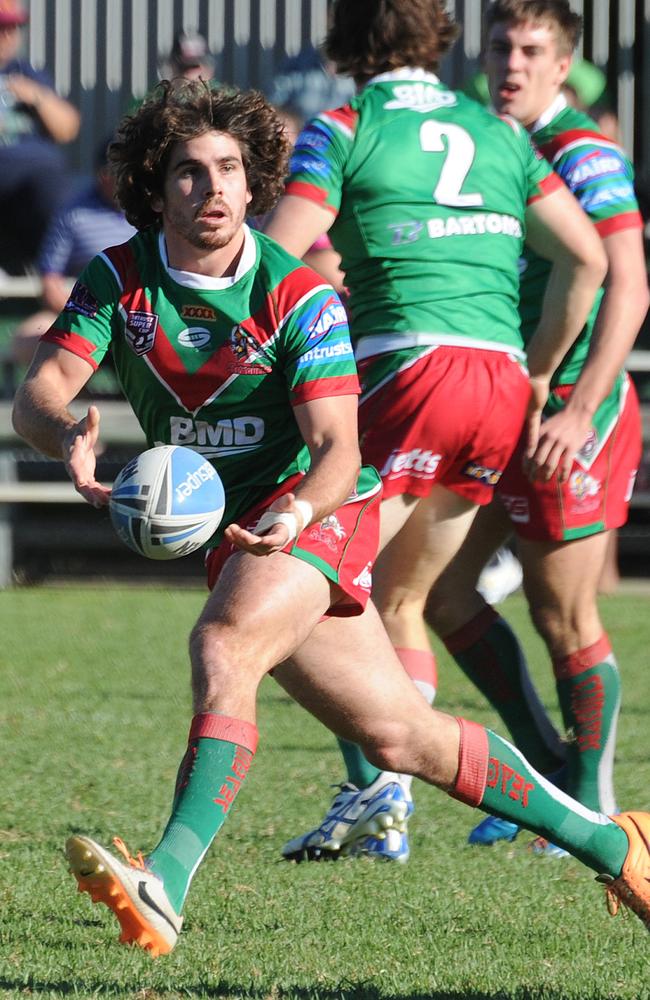 Jake Granville sends a pass for Wynnum Manly. Picture: Peter Cronin