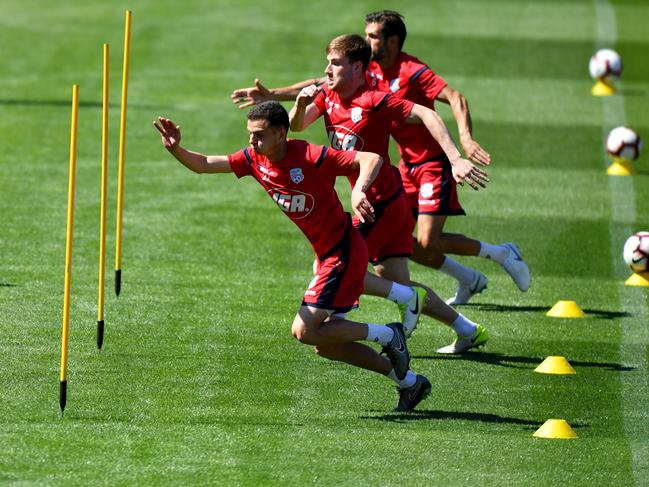 Players are seen during an Adelaide United training session at Coopers Stadium in Adelaide, Thursday, October 25, 2018. (AAP Image/Kelly Barnes) NO ARCHIVING