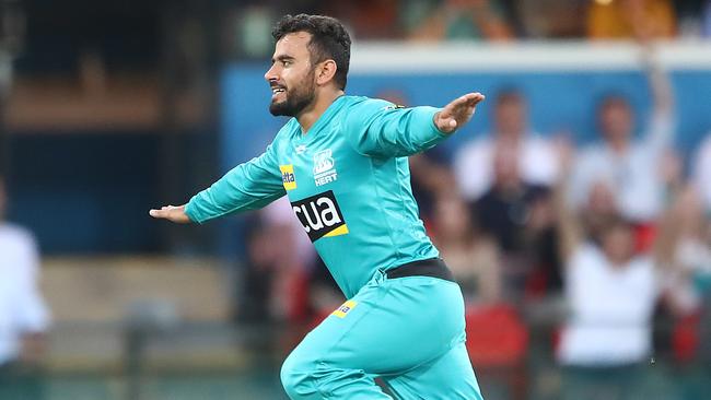 GOLD COAST, AUSTRALIA - JANUARY 01: Zahir Khan of the Heat celebrates taking a wicket during the Big Bash League match between the Brisbane Heat and the Perth Scorchers at Metricon Stadium on January 01, 2020 in Gold Coast, Australia. (Photo by Jono Searle/Getty Images)