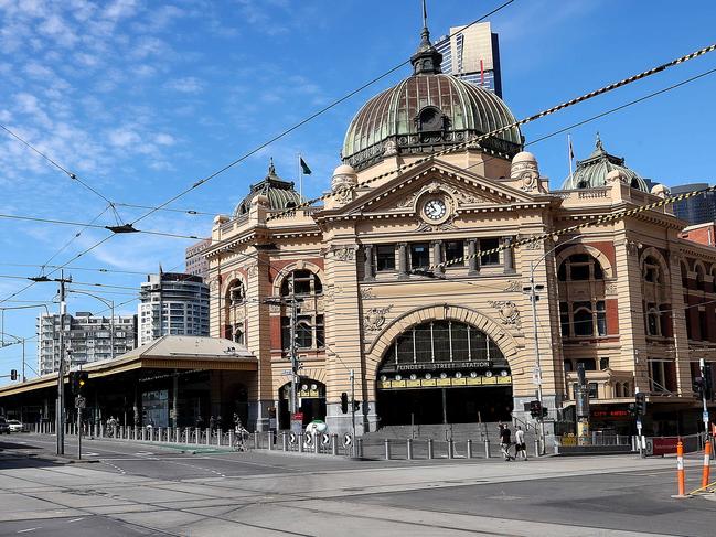 MELBOURNE , AUSTRALIA - NewsWire Photos FEBRUARY 17, 2021 : No traffic at the corner of Flinders  and Swanston Streets on MelbourneÃs last day of a five day lockdown following a hotel quarantine Covid-19 leak at the Holiday Inn, Melbourne Airport. Picture : NCA NewsWire  /  Ian Currie