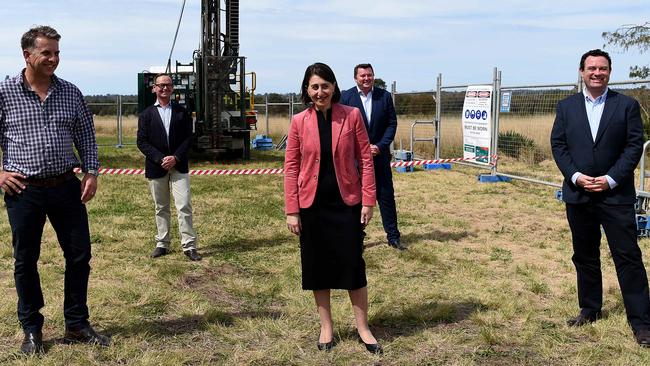 Premier Gladys Berejiklian (centre), Transport Minister Andrew Constance and Minister for Investment Minister Stuart Ayres (far right) at the site of the Western Sydney Airport. Picture: NCA NewsWire/Bianca De Marchi