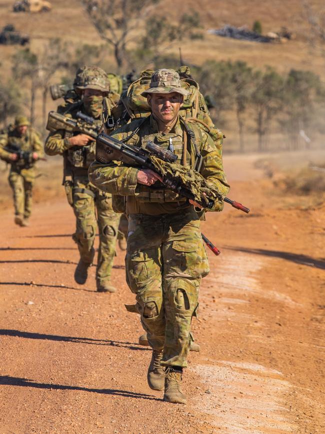 Australian Army soldiers serving with the 2nd Battalion, The Royal Australian Regiment, patrol near Stanage Bay during Exercise Talisman Sabre 2021. Exercise Talisman Sabre is a biennial combined Australian and US military exercise designed to train respective military forces in planning and conducting Combined Task Force operations to improve the combat readiness and interoperability between the respective forces. Picture: Supplied