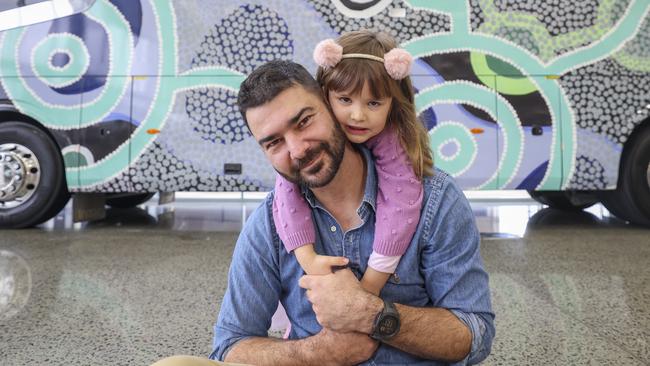 Ipswich Indigenous artist Jacob Sarra with daughter, Sofia, 4. Picture: Peter Wallis